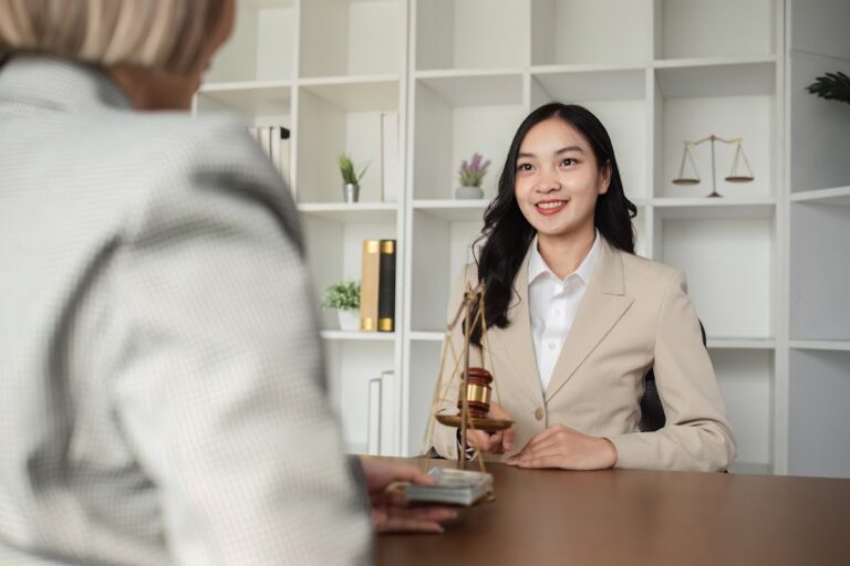 A professional attorney in an office discussing legal matters with a client.